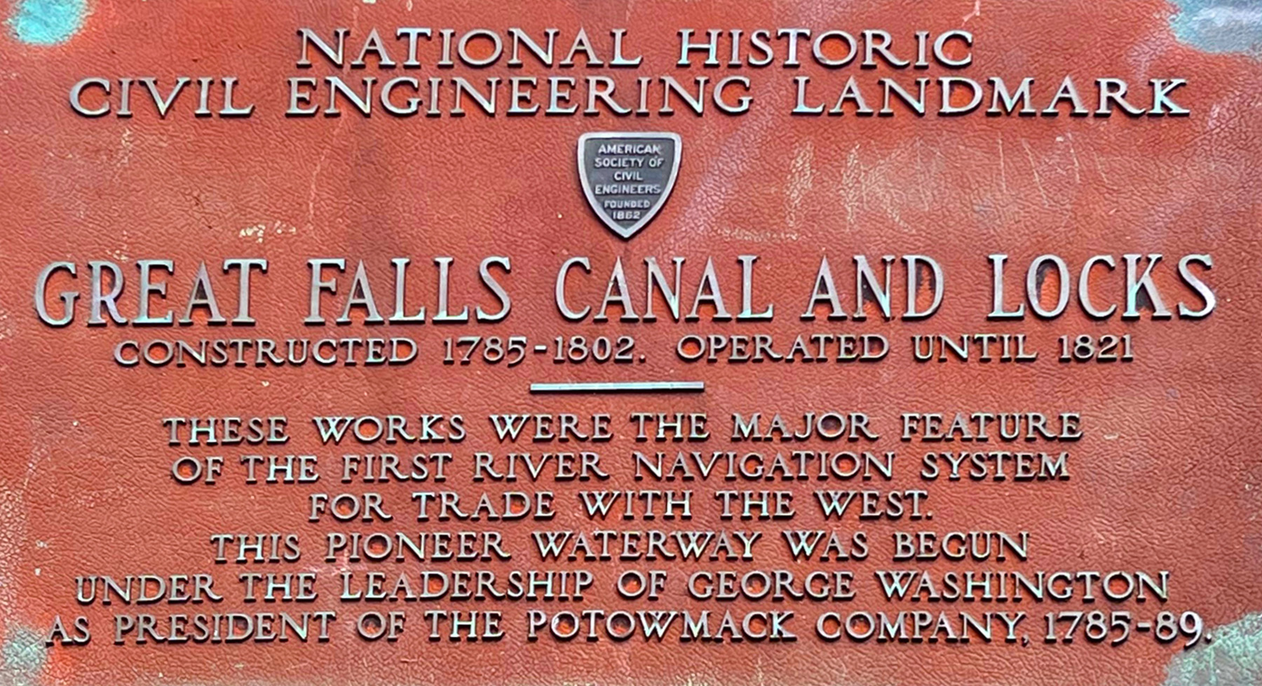 A plaque denoting the historic civil engineering landmark status of the Great Falls Canals and Locks.
