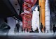 The rendering shows the space shuttle Endeavour, plus its external tank and side booster rockets, as it will be displayed inside its new home at the California Science Center: upright, as if ready to launch. 
