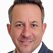 man smiles for camera