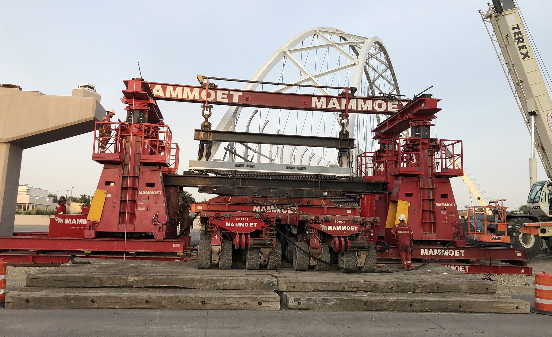 image of the bridge being lifted and placed image of the bridge being lifted and placed