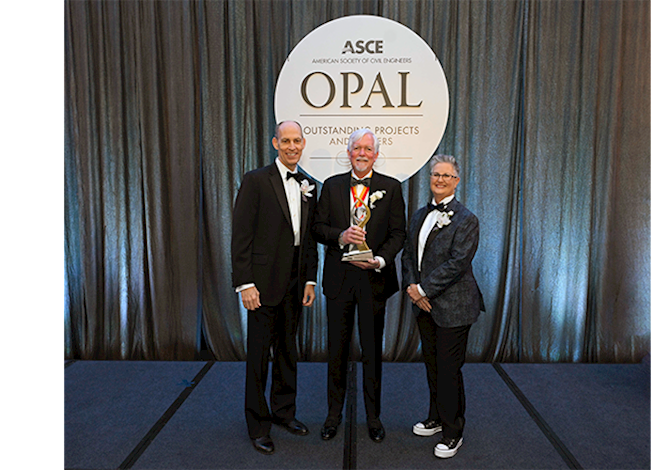 Roger Millar being presented with the OPAL award in government